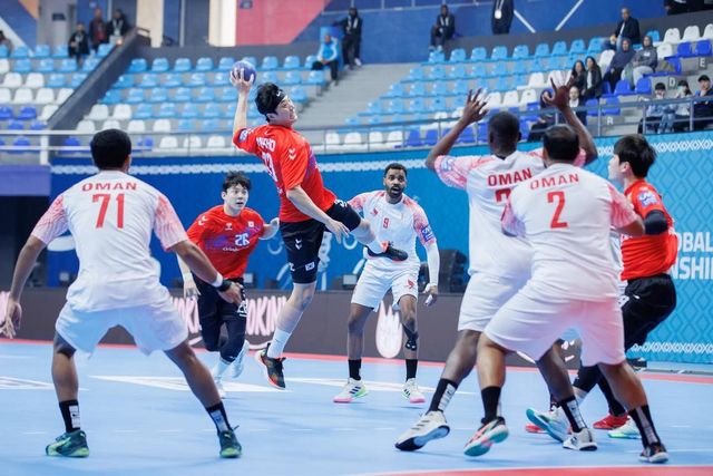 오만과 경기에서 슛을 던지는 하민호