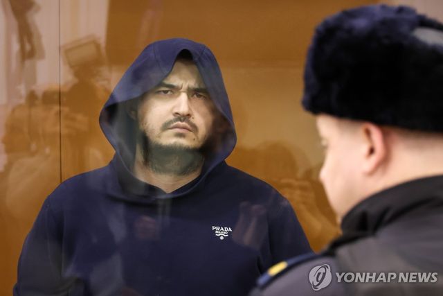 종신형 선고받은 아흐마존 쿠르보노프