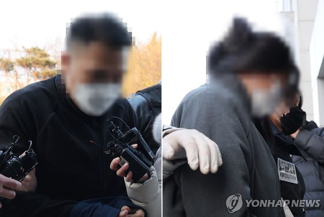 울산경찰청으로 압송되는 '로맨스 스캠' 부부 사기단