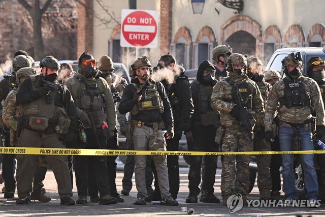 24일(현지시간) 미국 미네소타주 미니애폴리스에 배치된 연방 요원들