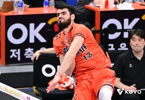 스파이크하는 OK저축은행의 디미트로프 