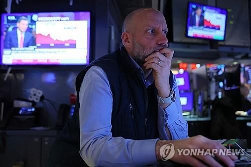 뉴욕 증권거래소의 트레이더