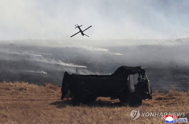 김정은,보병·탱크병구분대 협동공격전술연습 참관