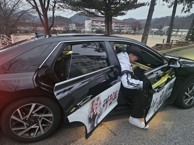 통학택시 이용하는 학생