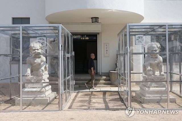 중국으로 귀향 결정 '석사자상'