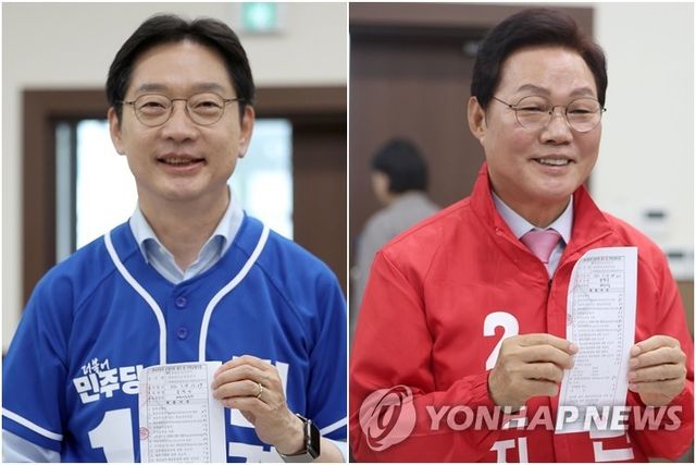왼쪽부터 김경수·박완수, 경남지사 후보 등록