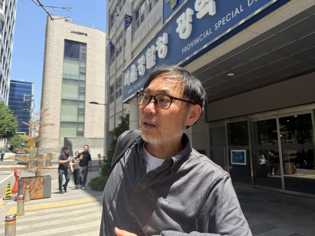 질문에 답하는 김순환 서민위 사무총장