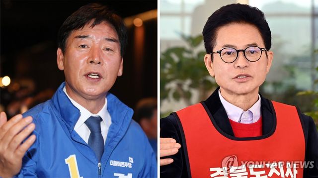 오중기 후보(왼쪽)와 이철우 후보