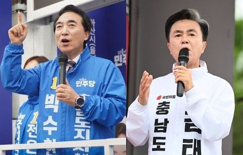 박수현 후보(왼쪽))와 김태흠 후보