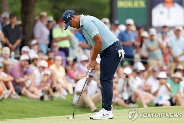 퍼트하는 김시우