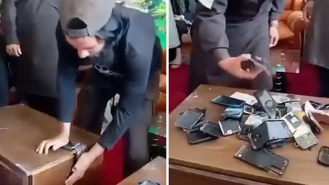 스마트폰 파괴하는 탈레반 당국