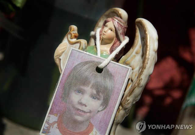 2012년 5월 미국 뉴욕 임시 추모 공간에 걸린 에탄 파츠 사진