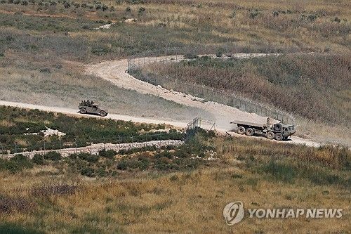 레바논 남부에 투입된 이스라엘군 차량들