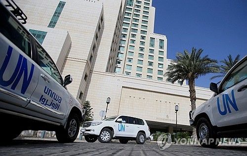 시리아에서 화학무기 사찰 활동을 벌이는 OPCW [로이터 연합뉴스 자료사진. 재판매 및 DB 금지] 