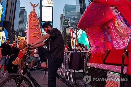 뉴욕 타임스스퀘어의 관광용 인력거 '페디캡'