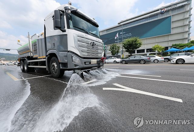달아오른 아스팔트를 식혀라