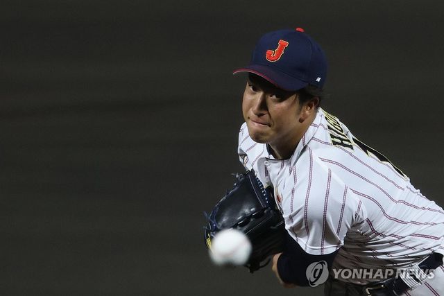 역투하는 히구치 신