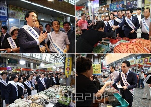 ▲박수현 충남도지사가 추석 연휴를 하루 앞둔 지난 23일, 천안 전통시장을 찾아 진열된 물건을 살피며 상인들의 애로사항을 청취하고 있다. /사진-충남도(편집 류석만 기자)