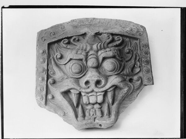 Silla-era goblin-face roof tile from Daegu. Photo by National Museum of Korea.