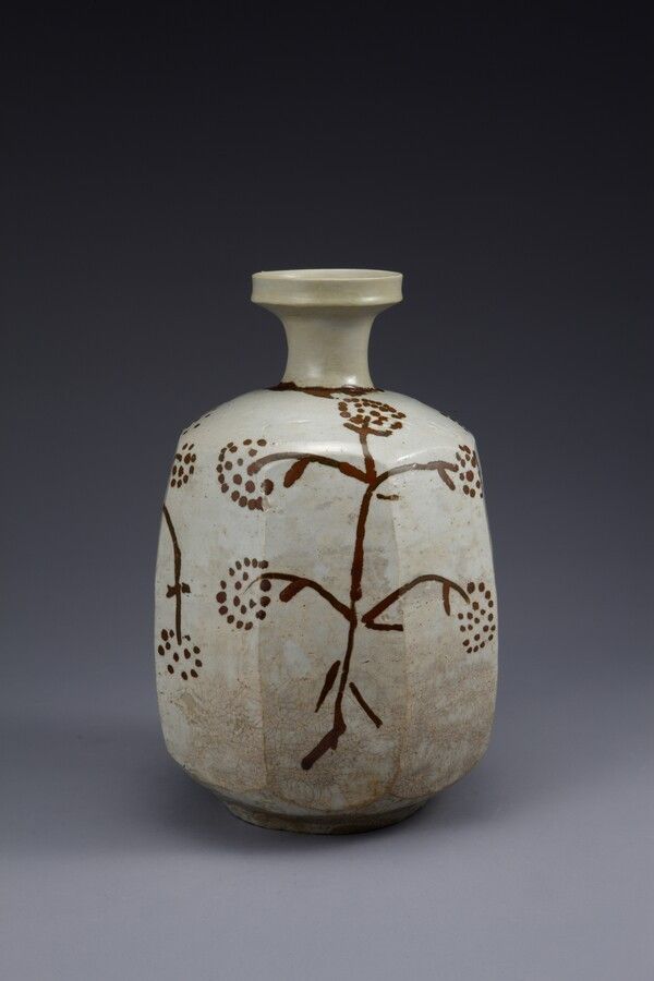 White porcelain faceted bottle with iron-painted grass and flower motifs. Photo by National Museum of Korea.