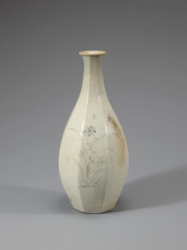 White porcelain faceted bottle with cobalt-blue orchid motifs. Photo by National Museum of Korea.