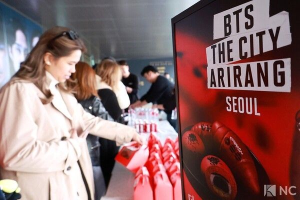 A café near Gwanghwamun Square sells BTS-themed food and beverage packages ahead of the group's comeback live event in Seoul. Photo by Kim Gyubin.