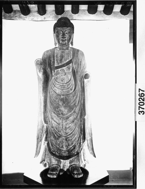 Standing Gilt-Bronze Medicine Buddha from Baengnyulsa Temple. Photo by Gyeongju National Museum.