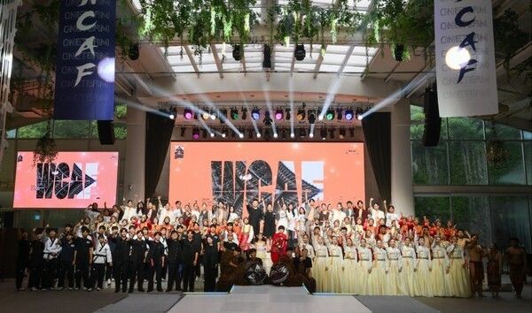 Young performers and instructors pose for a group photo after the 2026 WCAF in Seoul at the World K-POP Center on Aug. 14. Photo courtesy of LOVEROCK