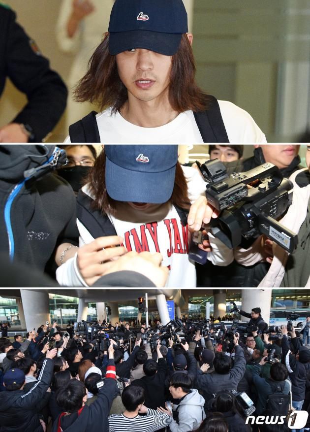 이성과의 성관계를 불법 촬영해 유포한 혐의로 입건된 가수 정준영(30)이 12일 오후 인천국제공항을 통해 입국하고 있다. 2019.3.12/뉴스1 ⓒ News1 권현진 기자