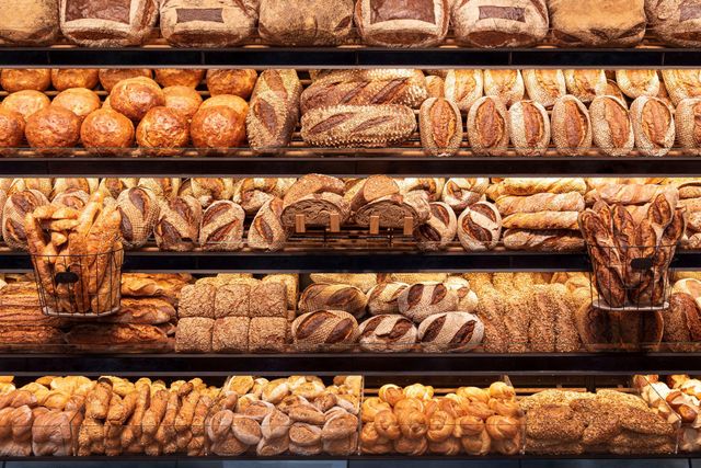 Bakery shelf with many types of bread