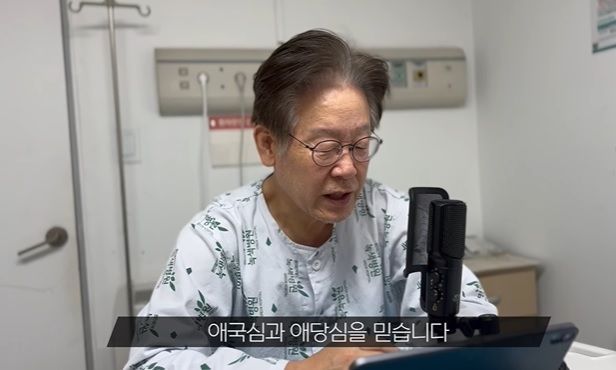 이재명 더불어민주당 대표가 5일 병상에서 촬영한 영상을 통해 강서구청장 보궐선거 투표를 독려하고 있다. ⓒ이재명 대표 페이스북 캡처