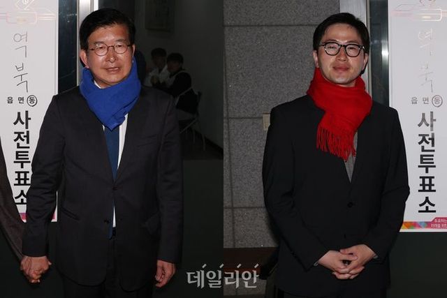 22대 총선 사전투표가 시작된 5일 오전 경기도 용인 처인구 역북동 사전투표소에서 경기 용인갑 선거구 이상식 더불어민주당 후보와 이원모 국민의힘 후보가 배우자와 함께 각각 사전투표를 마친 뒤 기념촬영을 하고 있다. ⓒ데일리안 홍금표 기자