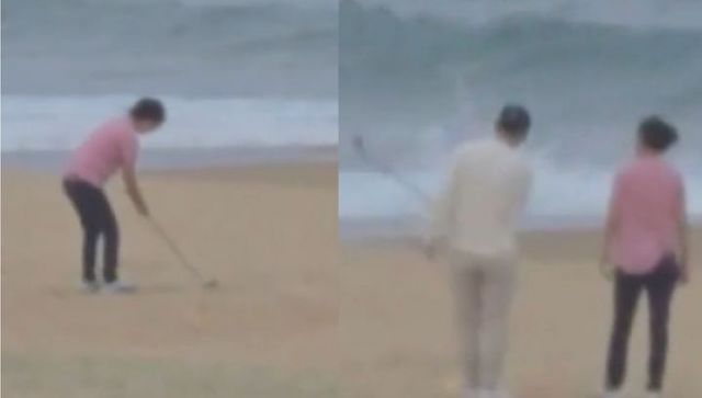  한 남녀가 해변에서 골프 연습을 하는 모습이 포착됐다. /사진=YTN 보도화면 캡처