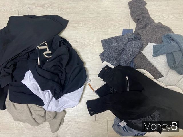 옷장 안도 '메이드 인 차이나' 제품으로 가득했다. 직접 원산지를 비교하며 중국산 제품과 아닌 제품을 분리했다. /사진=최성원 기자