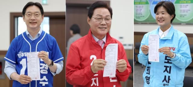 경남지사에 출마한 후보들이 지난 14일 경남 창원시 성산구 경남도선거관리위원회에서 후보 등록을 마친 후 후보자등록 신청서류 접수 및 기탁금영수증을 취재진에게 들어 보이고 있다사진연합뉴스