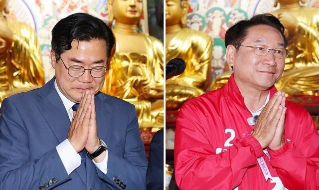 부처님오신날인 24일 더불어민주당 박찬대 인천시장 후보와 국민의힘 유정복 인천시장 후보가 인천 미추홀구 수도사에서 불자들에게 인사하고 있다 사진연합뉴스