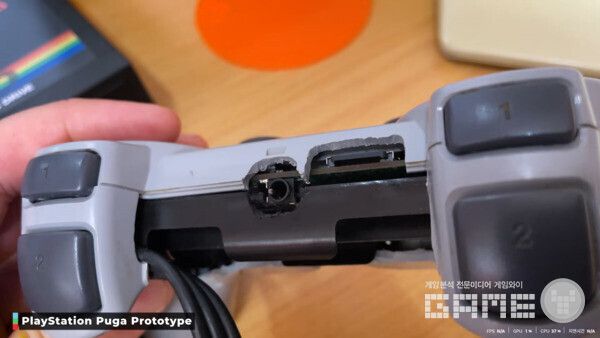 On the outside it looks like a gray DualShock, but inside it held the hardware to run a PS1.