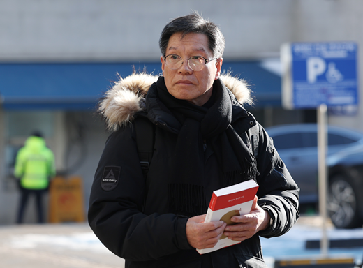 ▲ 김병헌 위안부법폐지국민행동 대표가 올해 2월 3일 서초경찰서에 피의자 신분으로 출석했다. 사진=뉴시스