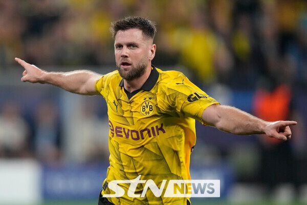 결승골을 뽑아낸 직후 보루시아 도르트문트 공격수 니클라스 퓔크루크의 모습. 사진┃뉴시스/AP