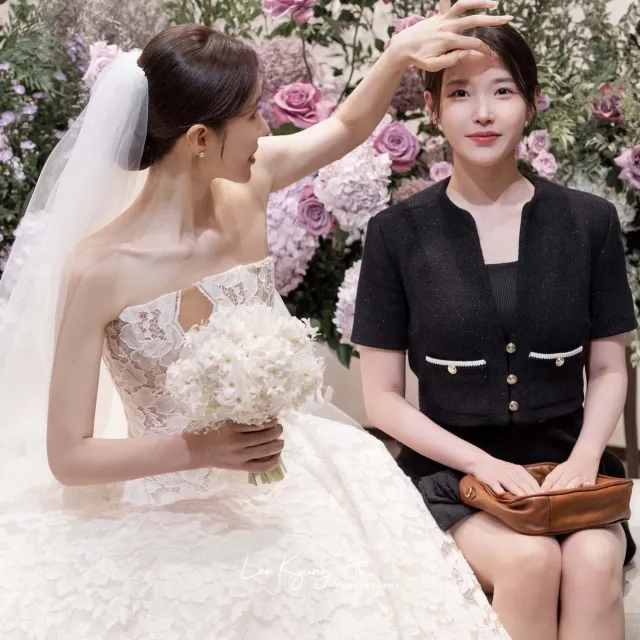 결혼식에 하객으로 갔다가 잔소리 듣는 아이유.jpg