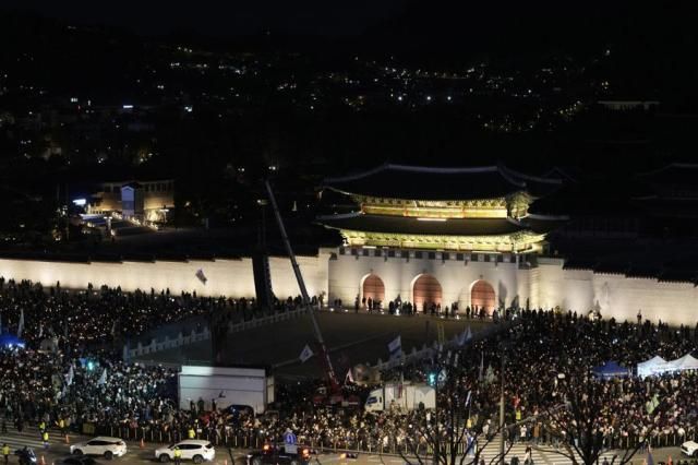 Protestors gather during a rally in Seoul on Nov 23 2024 AP-Yonhap