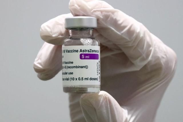 Medical staff prepares an AstraZeneca coronavirus vaccine during preparations at the vaccine center in Ebersberg near Munich Germany on March 22 2021 AP-Yonhap