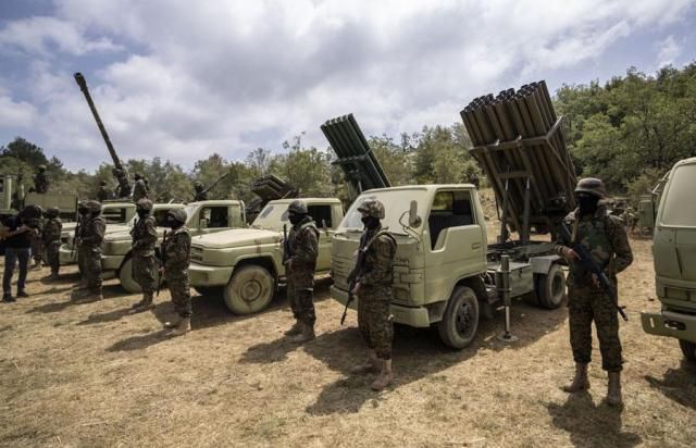 Fighters from the Lebanese militant group Hezbollah carry out a training exercise in Aaramta village in the Jezzine District southern Lebanon on May 21 2023 AP-Yonhap