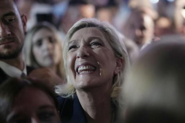 French far right leader Marine Le Pen reacts as she meets supporters and journalists after the release of projections based on the actual vote count in select constituencies in Henin-Beaumont northern France on June 30 2024 AP-Yonhap