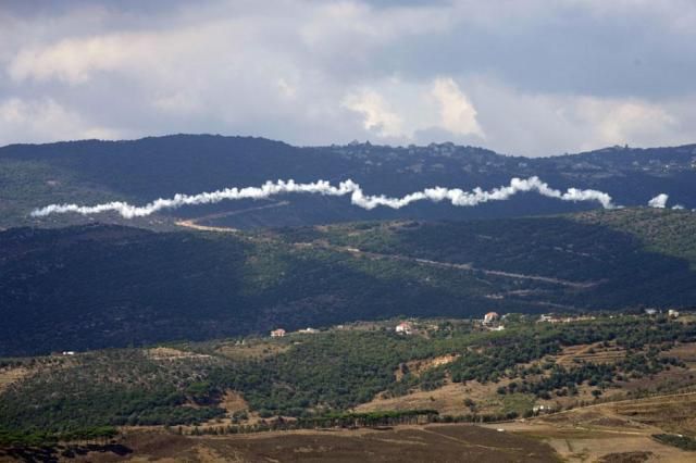 The smoke trail from a Hezbollah rocket is visible from the southern Lebanese town of Marjayoun on Sept 21 2024 AP-Yonhap