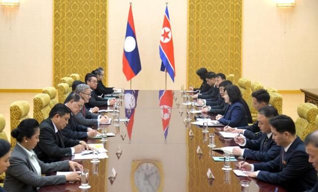 Laotian Foreign Minister Thongsavanh Phomvihane and other officials attend a meeting with their counterparts in Pyongyang on Nov 11 2025 in this photo released by the official North Korean Central News Agency the following day