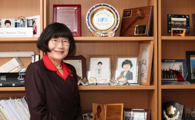 Chung Heesun a chaired professor of forensic science at Sungkyunkwan University poses for a photo in her office on Dec 16 2025 AJP Yoo Na-hyun