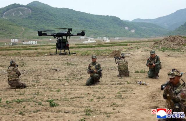 North Korean leader Kim Jong-un observed a comprehensive drill conducted as part of a training system for military officers on May 13 KCNAYONHAP