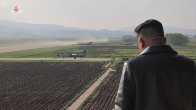 North Korean leader Kim Jong-un observes an air force air defense and strike drill during his visit to a flight regiment under the 1st Air Division on May 15 KVNA YONHAP