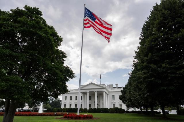 An American flag flies in front of the White House in Washington DC on July 23 2025 AP-Yonhap